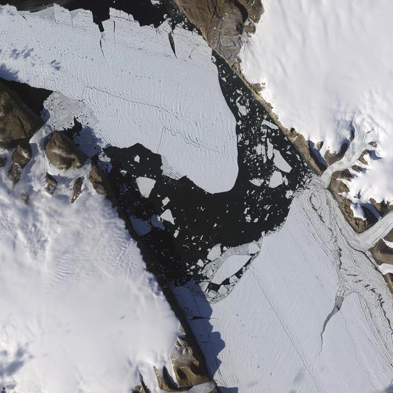 Warming-stoked tides eating huge holes in Greenland glacier